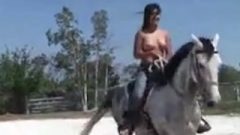 Topless Thai Teen Riding A Horse