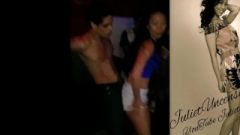 Arousing Young Couple Dancing In The Club