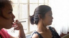 Two Thai Teens Smoking